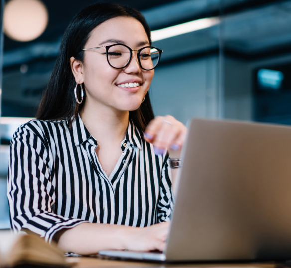 woman looking at laptop